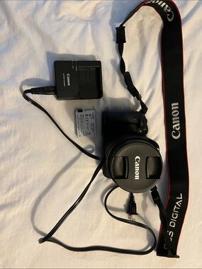 Canon Mirrorless Camera with Black and Red Branded Strap EOS REBEL T5I